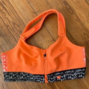SheFit 2luxe Flex Orange & Black “Believe” Medium Impact Sports Bra